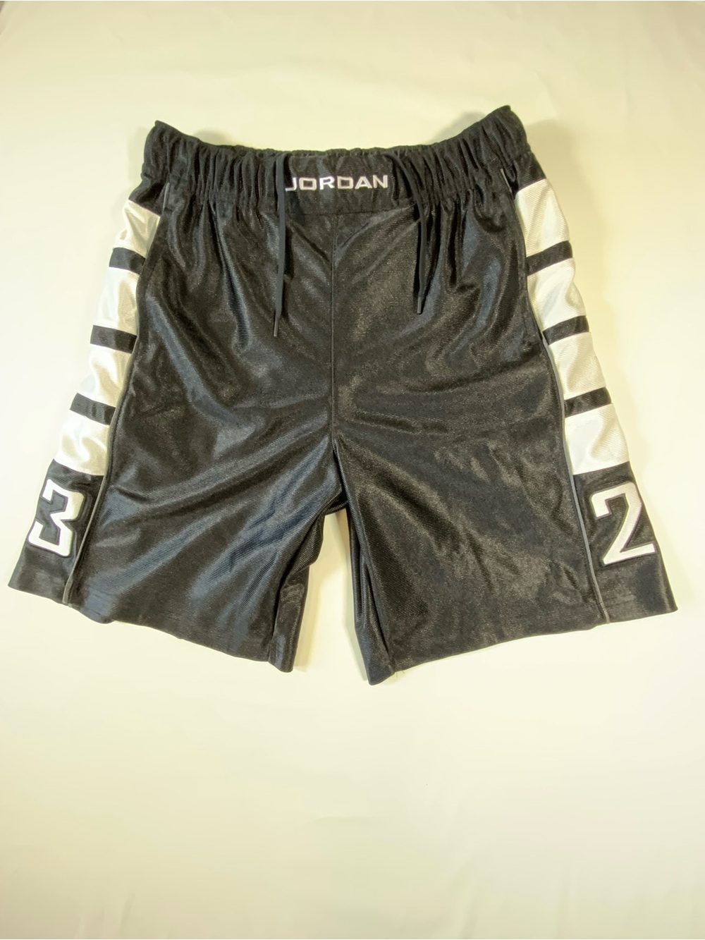 Jordan Men’s Black Athletic Shorts with White Side Panels and Number Accents